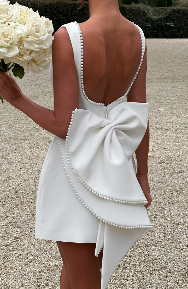 Summer occasion dress: women's A-line mini with elegant pearl trim, comfortable and fashionable.