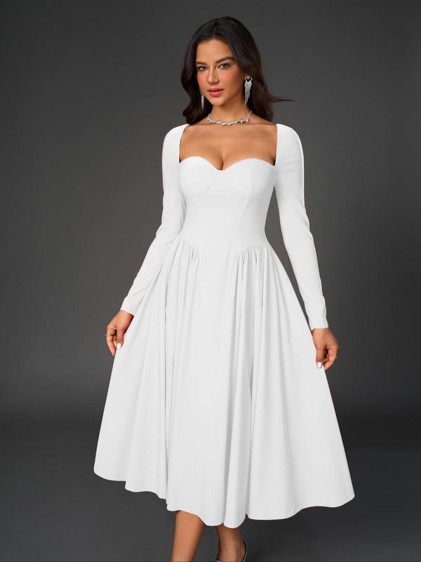 Close-up of elegant women's sweetheart neck A-line dress. Ruched bodice & sophisticated detailing.