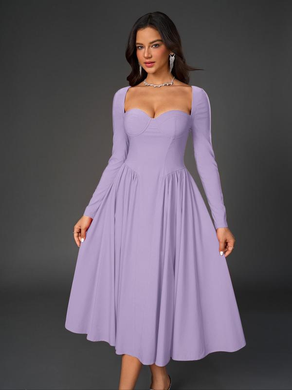 Chic women's A-line occasion dress, featuring a ruched sweetheart neck, flowing skirt & stylish tie-back.