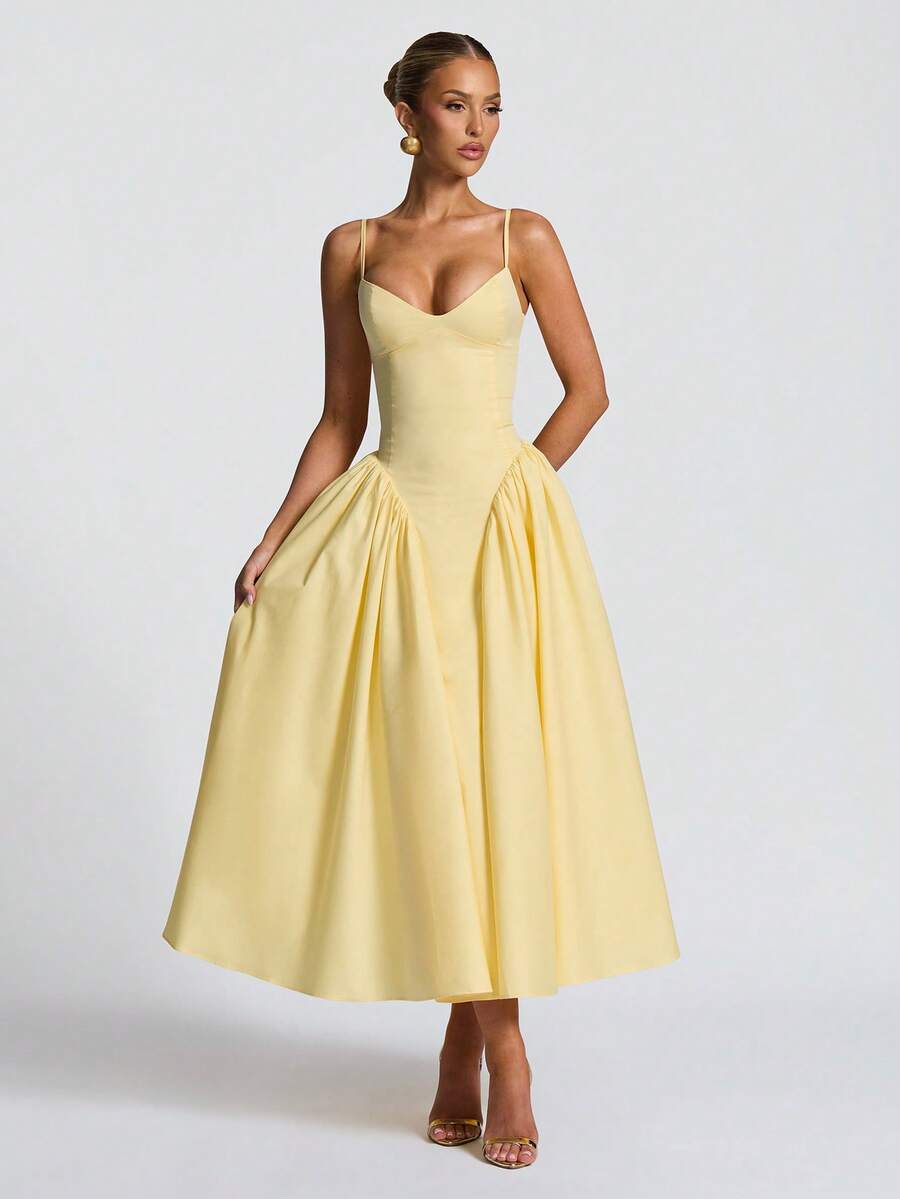 Chic women's A-line midi dress with flowy silhouette, ideal for elegant occasion or party wear.