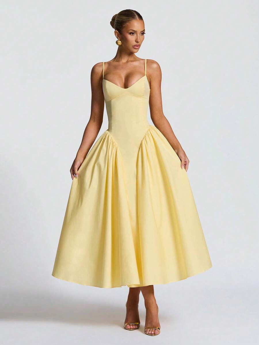 Stylish women's A-line midi dress, comfortable for wedding guests or summer party events.