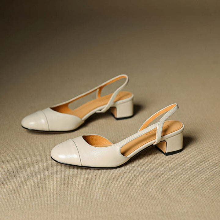 Back view: Sturdy block heel on women's elegant almond-toe slingback shoes.