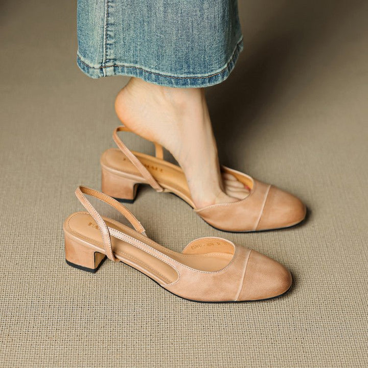 Classic women's block heel pumps with almond toe & slingback strap, versatile style.