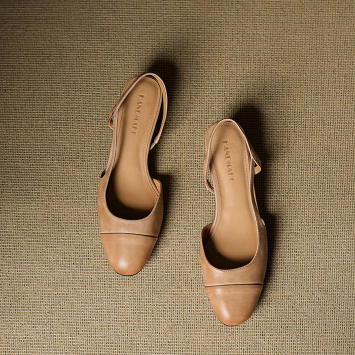 Formal women's black almond-toe slingback block heels, ideal for office & events.