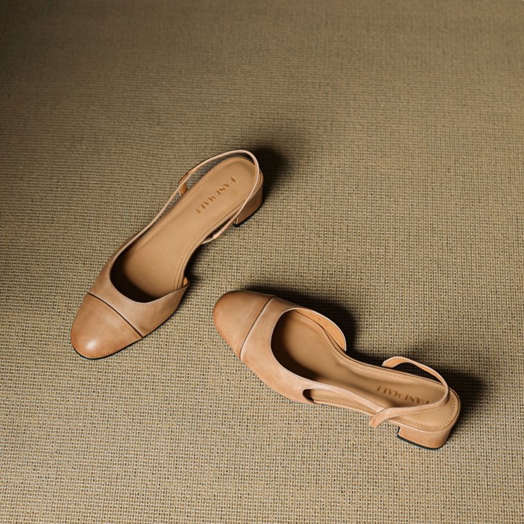 Stylish women's pumps: almond toe, slingback design, stable block heel footwear.