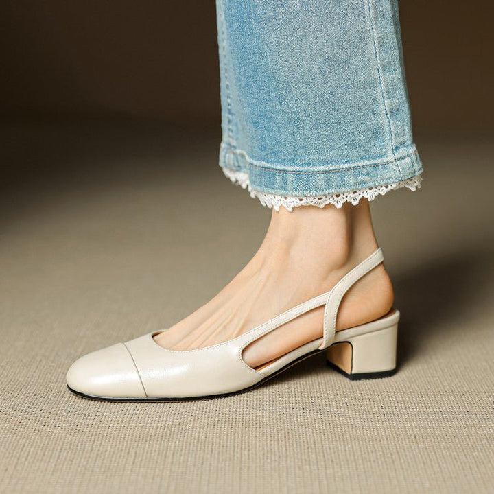 Women's formal footwear: elegant almond-toe slingback block heels for work.