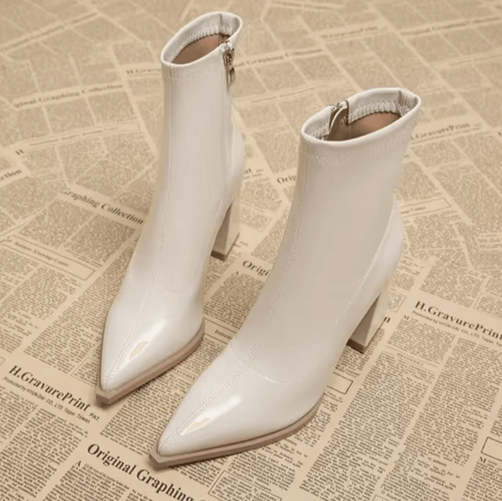 Elegant women's ankle boots, stylish black leather for everyday fashion & versatility. Perfect for fall & winter.