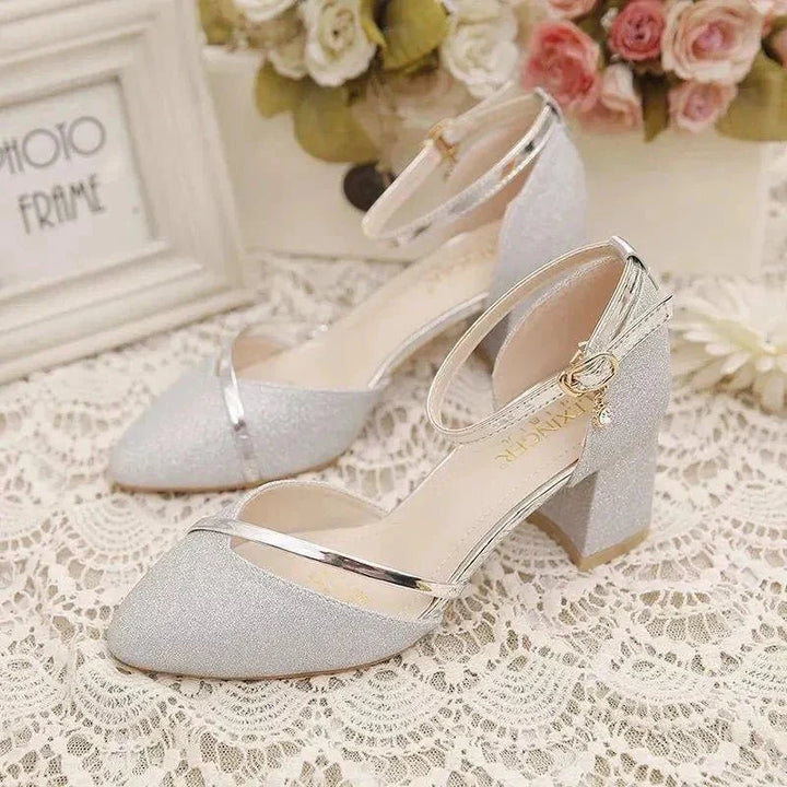 Elegant women's ankle strap block heel pumps with pointed toe for formal occasions & comfortable wear.