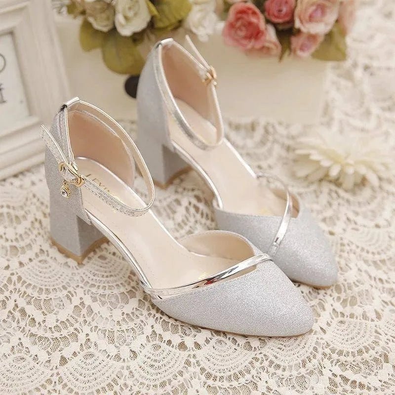 Classic pointed toe block heel pumps with elegant ankle strap. Perfect women's dress shoes for any event.