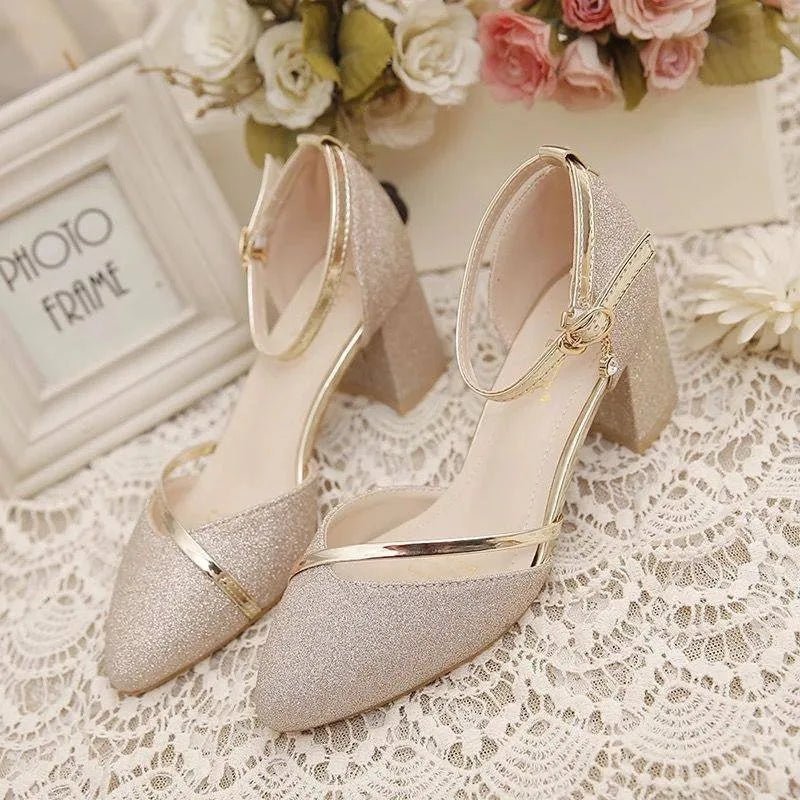 Comfortable and elegant women's block heel pumps with a stylish ankle strap & pointed toe. Ideal for all-day wear.