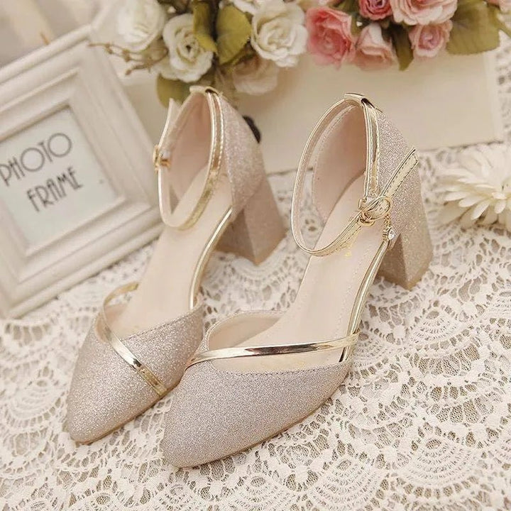 Comfortable and elegant women's block heel pumps with a stylish ankle strap & pointed toe. Ideal for all-day wear.