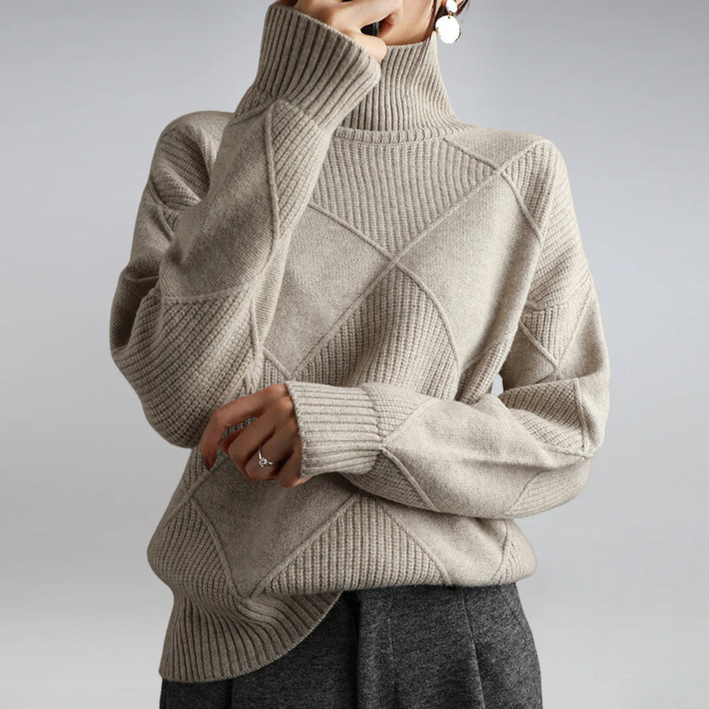 Stylish women's argyle turtleneck sweater. Versatile long sleeve knit for casual or office autumn wear.
