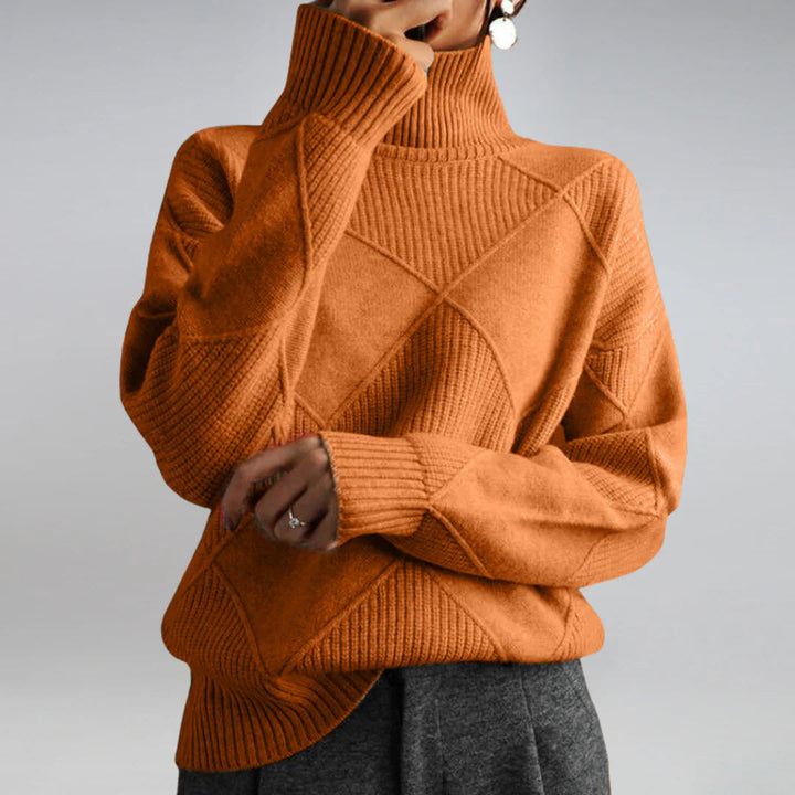 Classic women's argyle turtleneck sweater. Elegant knit long sleeve top, ideal for stylish autumn fashion.