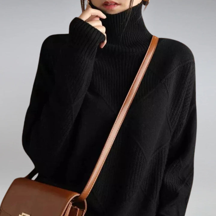 Soft women's argyle turtleneck sweater. Stylish knit long sleeve top for a chic, cozy autumn look.