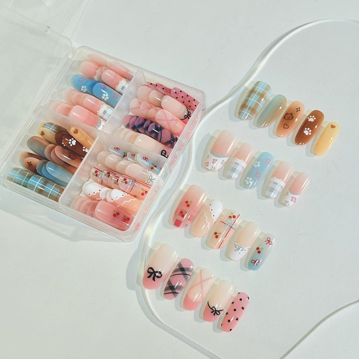Vibrant women's press-on nails featuring intricate nail art designs, perfect for a unique, fashionable look. Reusable.