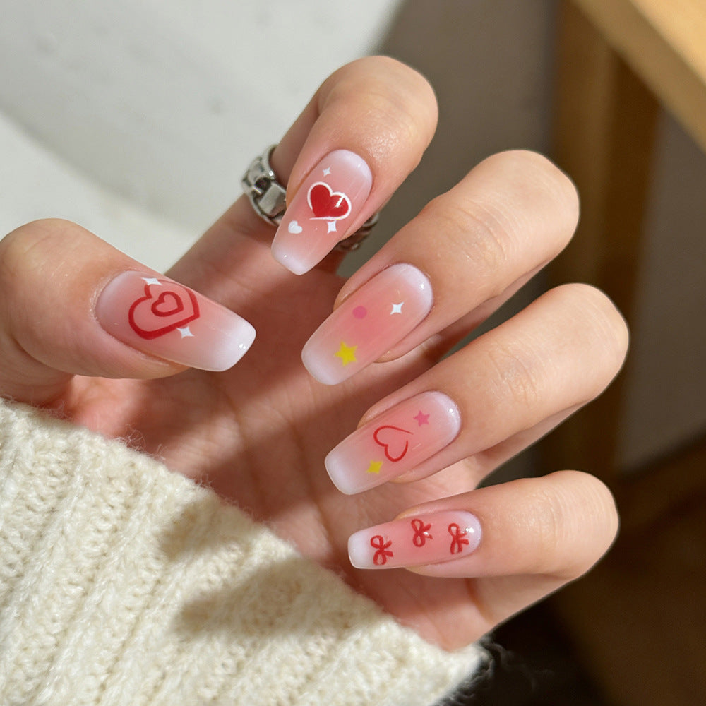Artistic women's false nails, a collection of diverse press-on nail designs for expressing unique style & beauty.