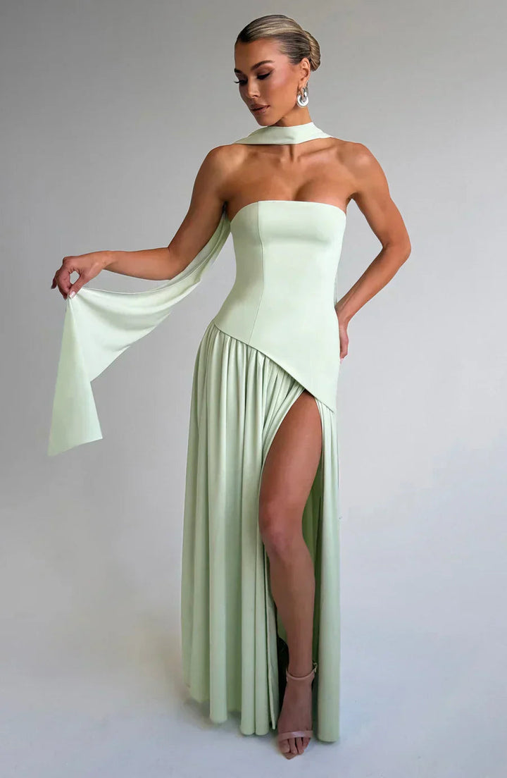 Women's asymmetric round neck maxi dress. Elegant formal wedding guest gown for sophisticated events.