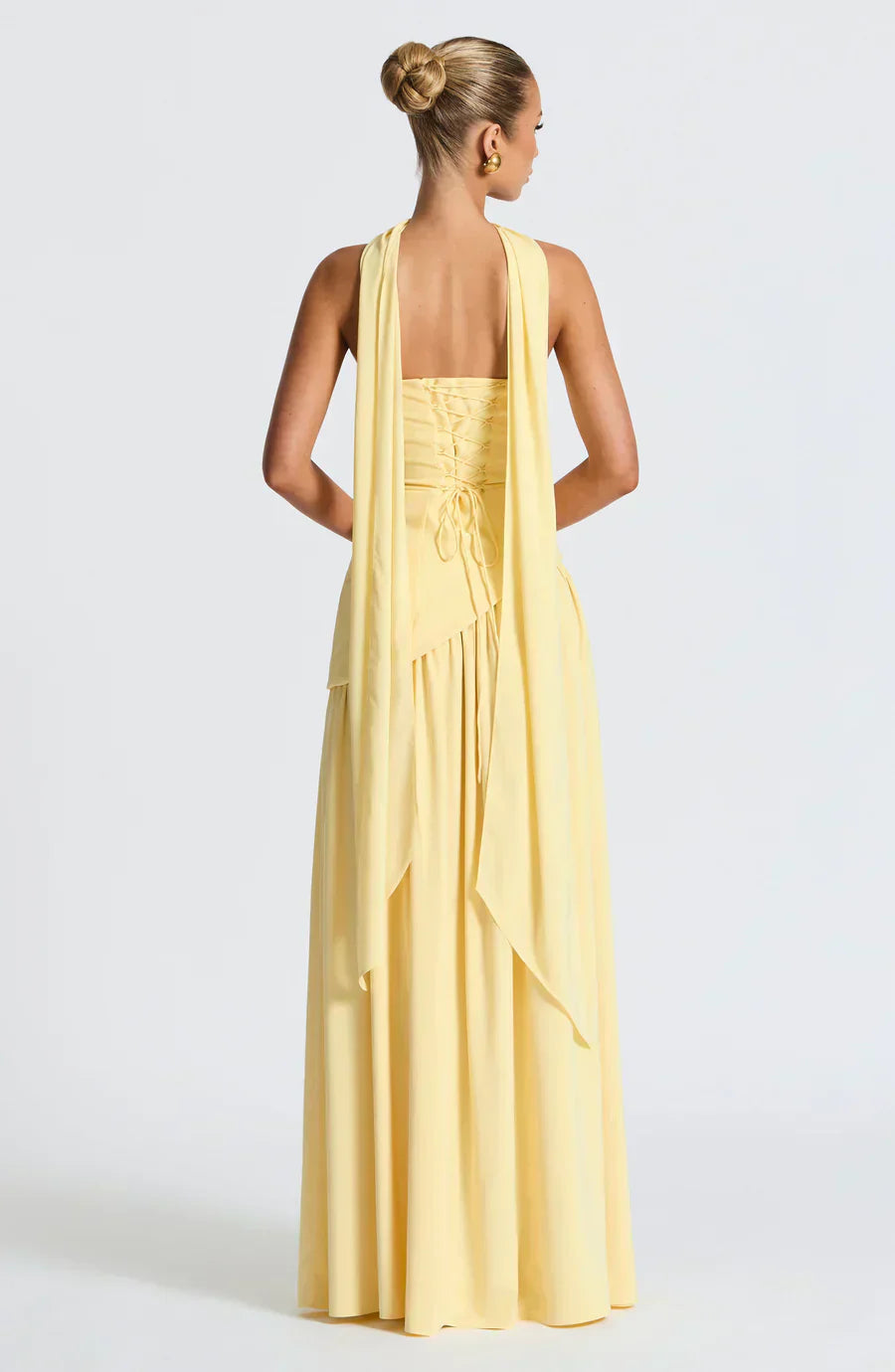 Chic asymmetric maxi dress for wedding guests. Round neck evening gown for special occasions.