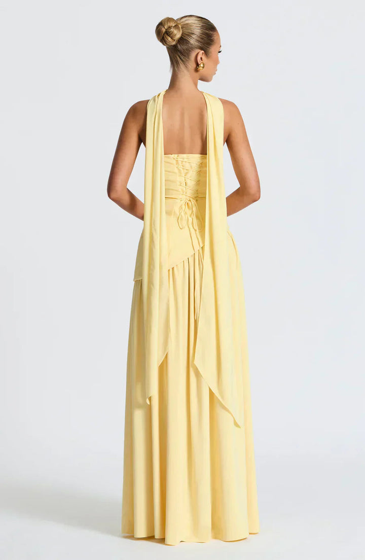 Chic asymmetric maxi dress for wedding guests. Round neck evening gown for special occasions.