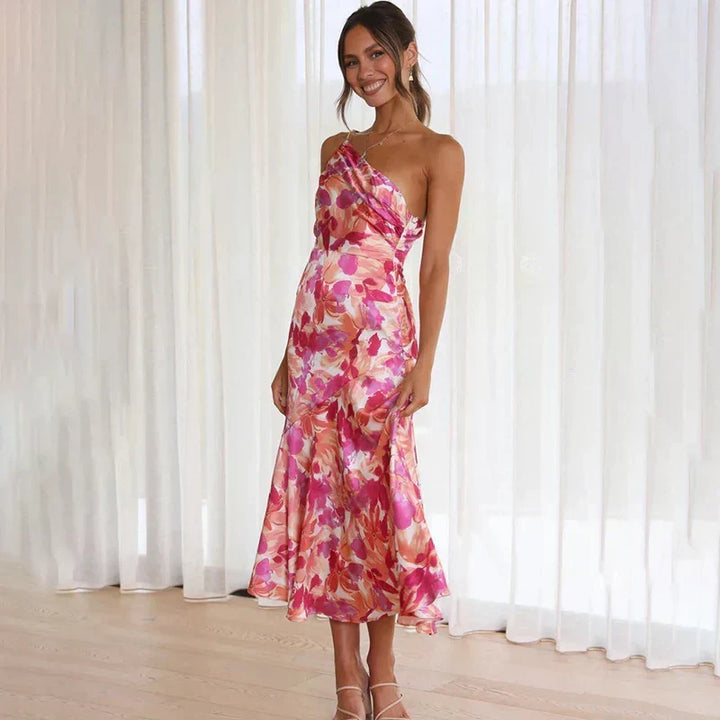 Stylish one-shoulder asymmetrical floral midi dress in pink, ideal for chic spring & summer fashion.