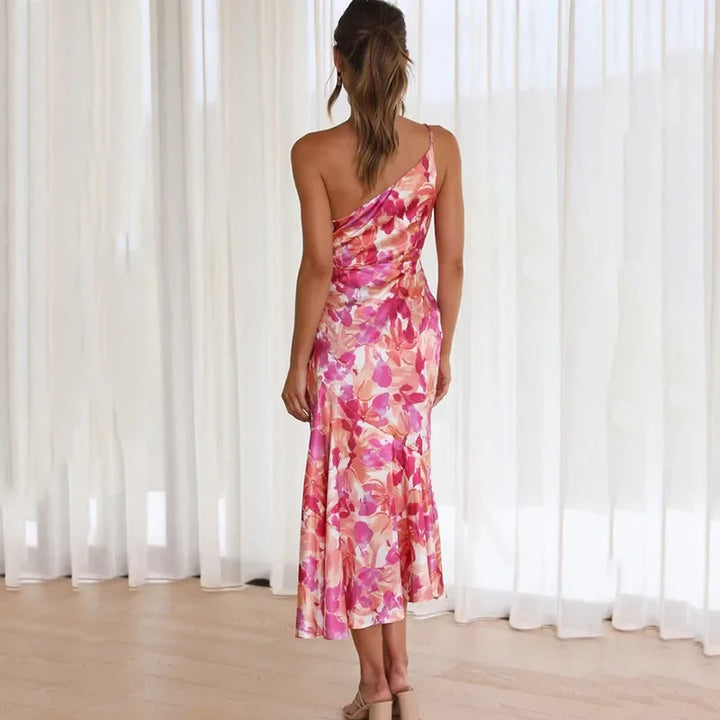 Versatile women's floral print asymmetrical midi dress for elegant spring and summer occasion wear.