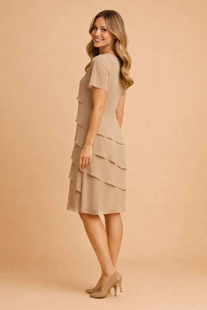 Women's elegant asymmetrical layered dress. A flattering, comfortable, and chic option for parties & casual wear.