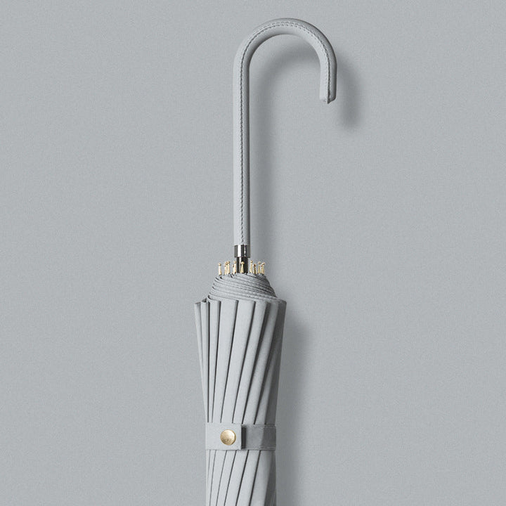 Compact ladies' umbrella, automatic folding & portable, perfect for travel & everyday rain.