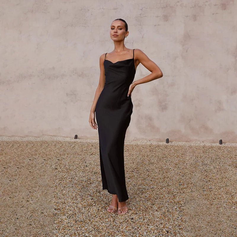 Sophisticated backless maxi dress, perfect for wedding guests or special occasions.