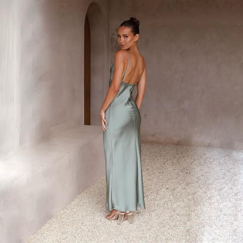 Long backless dress for women, elegant design with a sexy high slit for special occasions.