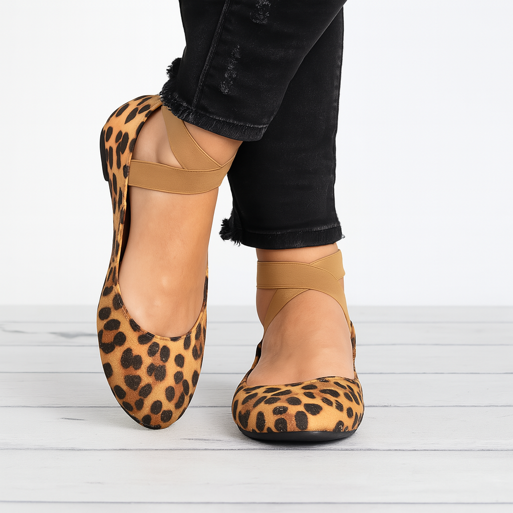 Elegant women's ballet flats with elastic strap, round toe, and comfortable slip-on design for everyday wear.