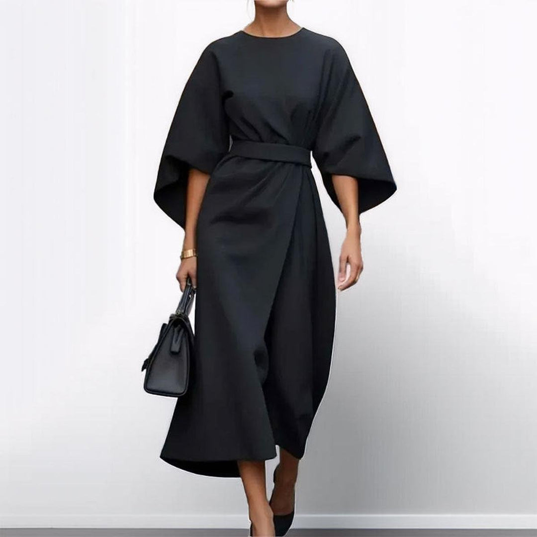 Stylish women's long dress with elegant batwing sleeves, ideal for formal occasions and versatile styling.