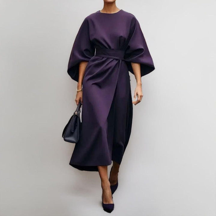 Sophisticated women's maxi dress, featuring elegant batwing sleeves for evening, formal, or casual wear.