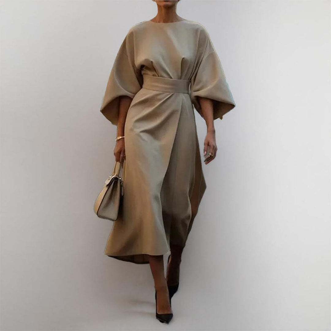 Elegant women's evening maxi dress with stylish batwing sleeves, perfect for formal events or a sophisticated look.