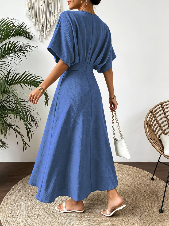 Beautiful women's batwing sleeve ruffle V-neck midi dress, designed for an elegant and flowy look.