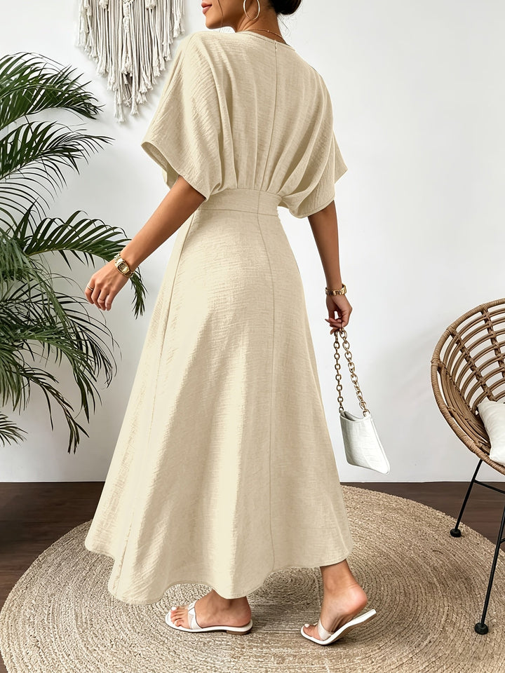 Versatile women's batwing sleeve midi dress with a ruffle V-neck. Perfect for casual chic or party wear.