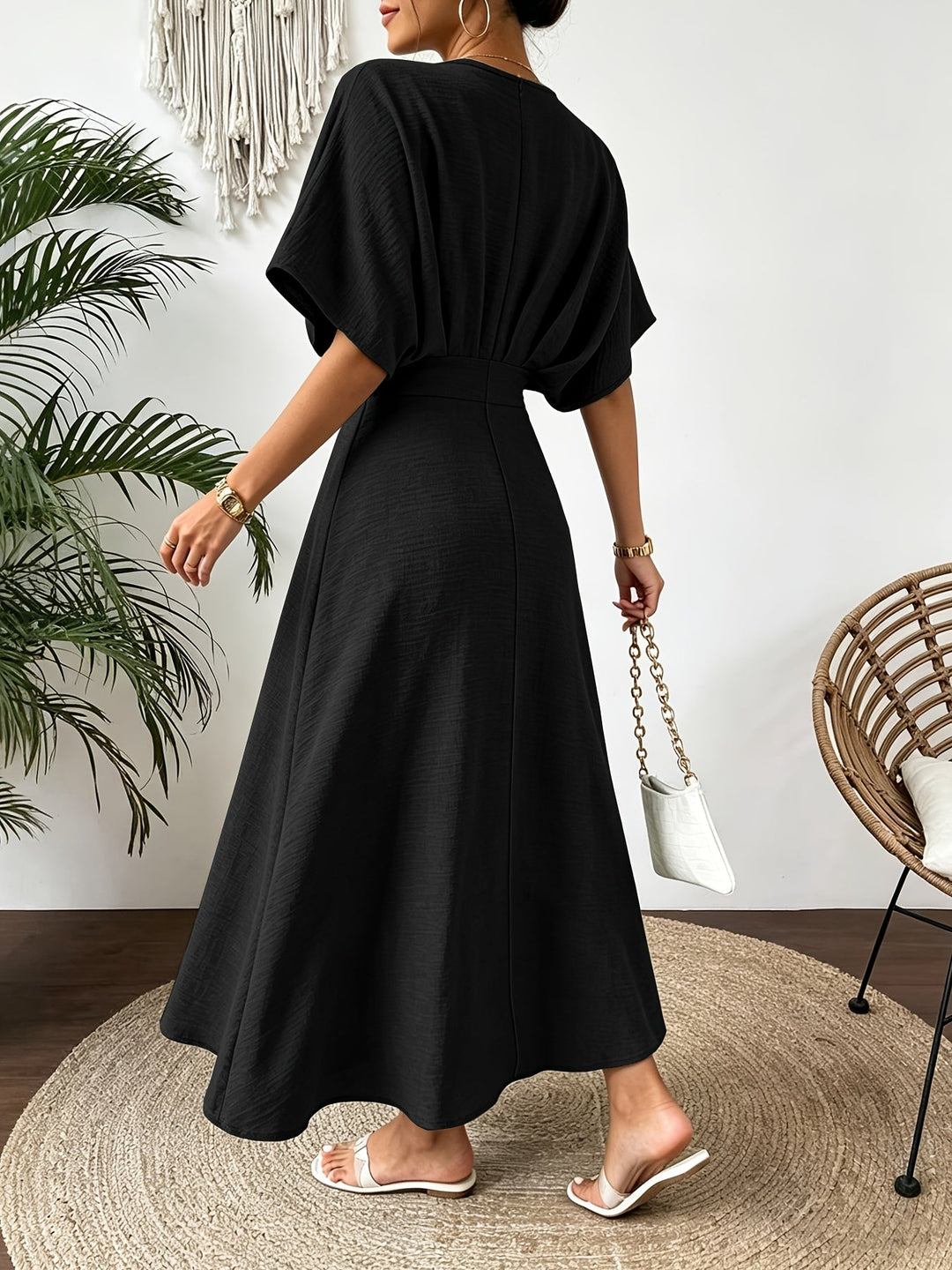 Front view: Elegant women's batwing sleeve ruffle V-neck midi dress, perfect for summer events.