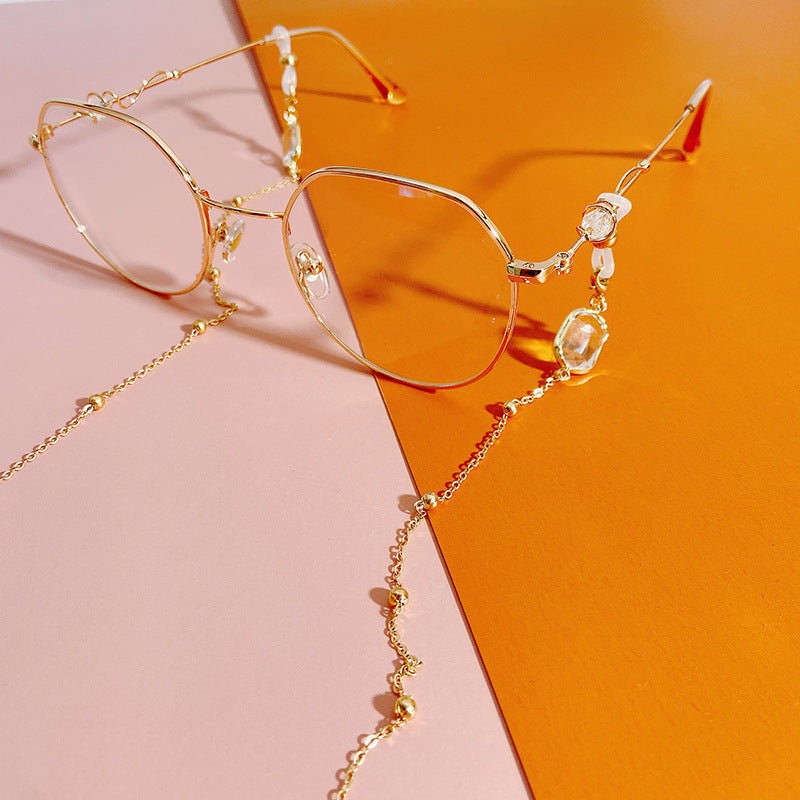 Fashionable women's accessory chain. Elegant crystal beaded holder for eyeglasses, sunglasses, or face masks.
