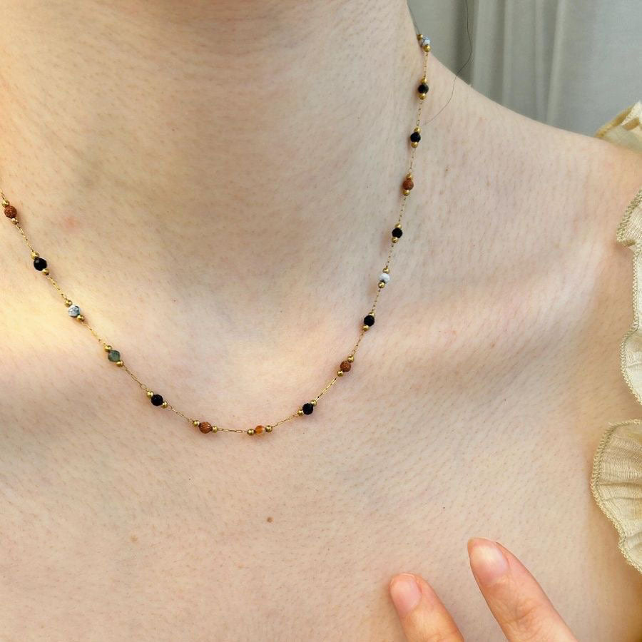 Delicate elegant beaded bracelet and matching necklace for women, a timeless fashion jewelry piece.