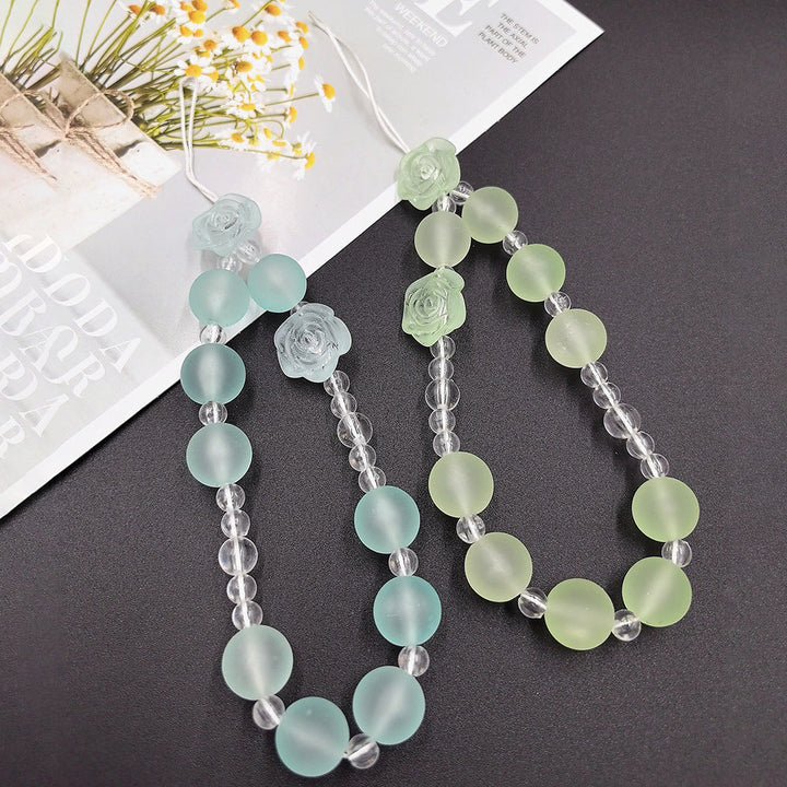 Elegant women's beaded necklace with delicate light blue & green floral accents, a timeless fashion accessory.