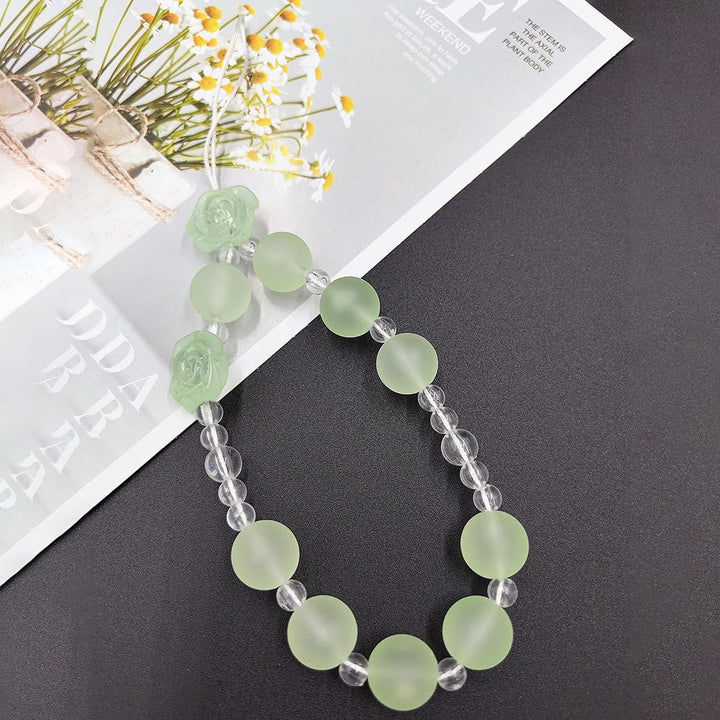 Timeless beaded necklace for women, an elegant fashion accessory with intricate floral details in soft colors.