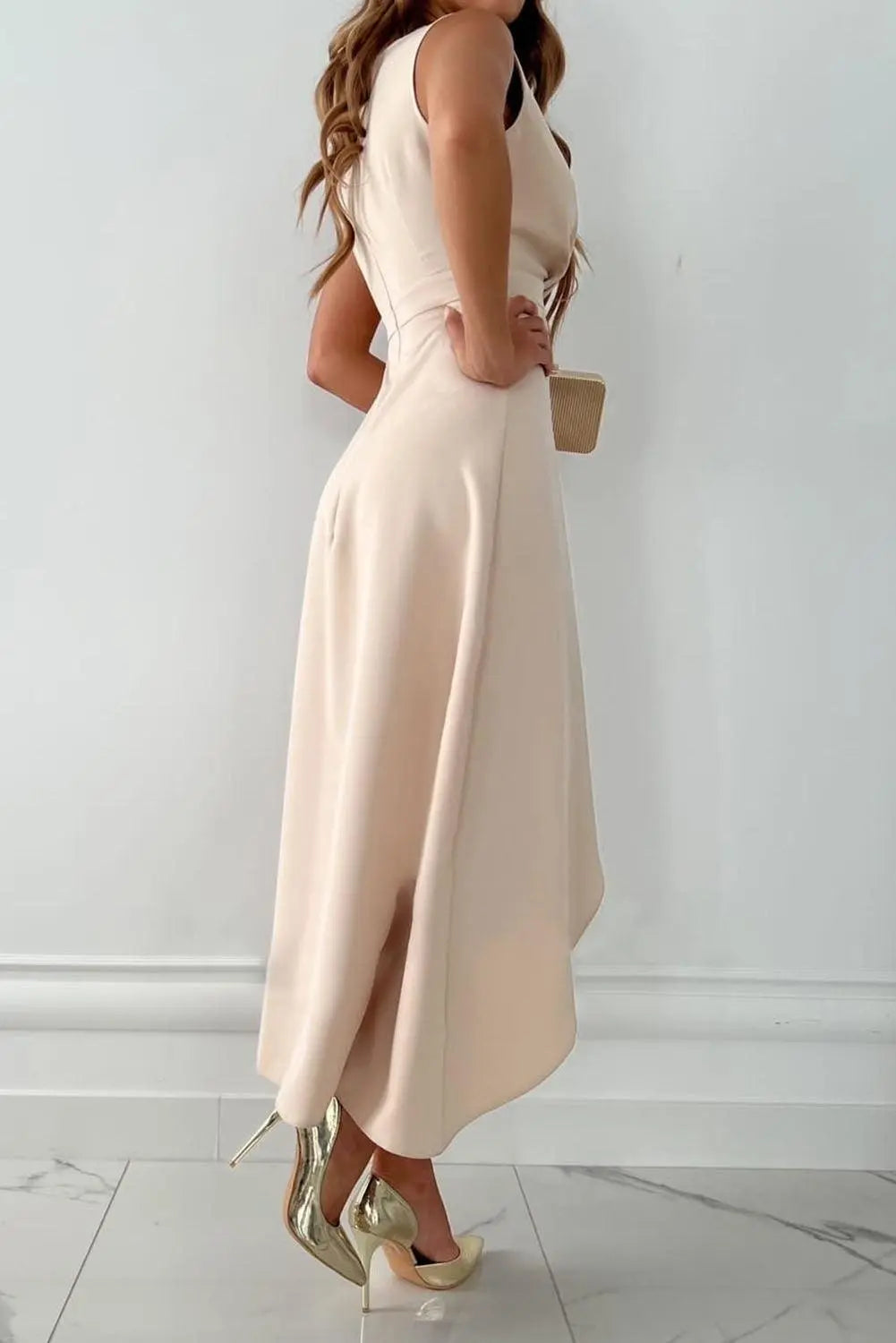 Formal women's beige V-neck midi wrap dress with an elegant asymmetric hem, ideal for special occasions & events.