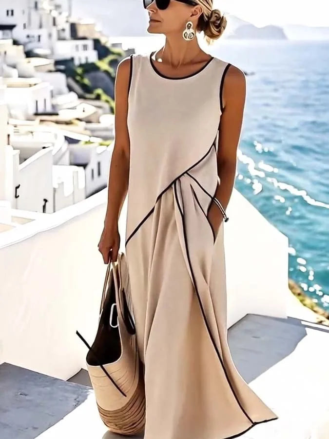 Comfortable women's sleeveless flared maxi dress in beige, offering a relaxed fit for elegant summer everyday style.