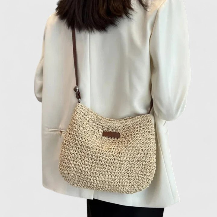 Elegant women's beige woven shoulder bag, a versatile everyday handbag with a chic textured design.