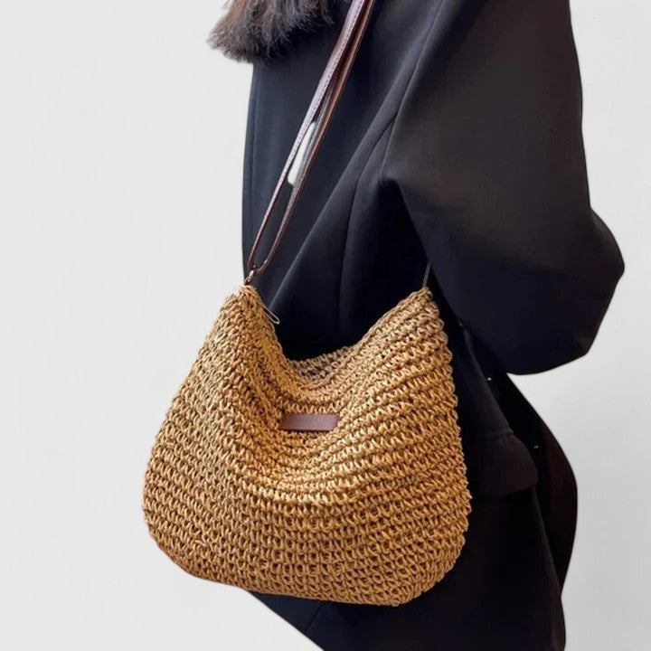 Chic women's khaki woven shoulder bag. This versatile everyday handbag adds an elegant touch to any outfit.