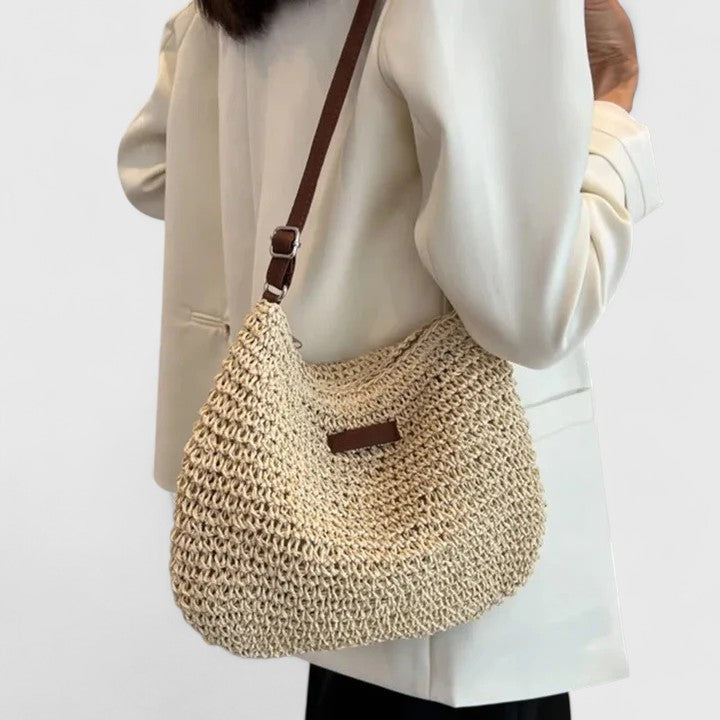 Stylish women's textured woven shoulder bag. A practical everyday handbag, perfect for versatile use.