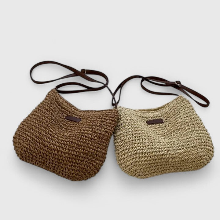 Fashionable women's woven shoulder bag, highlighting its unique texture. An elegant everyday khaki handbag.