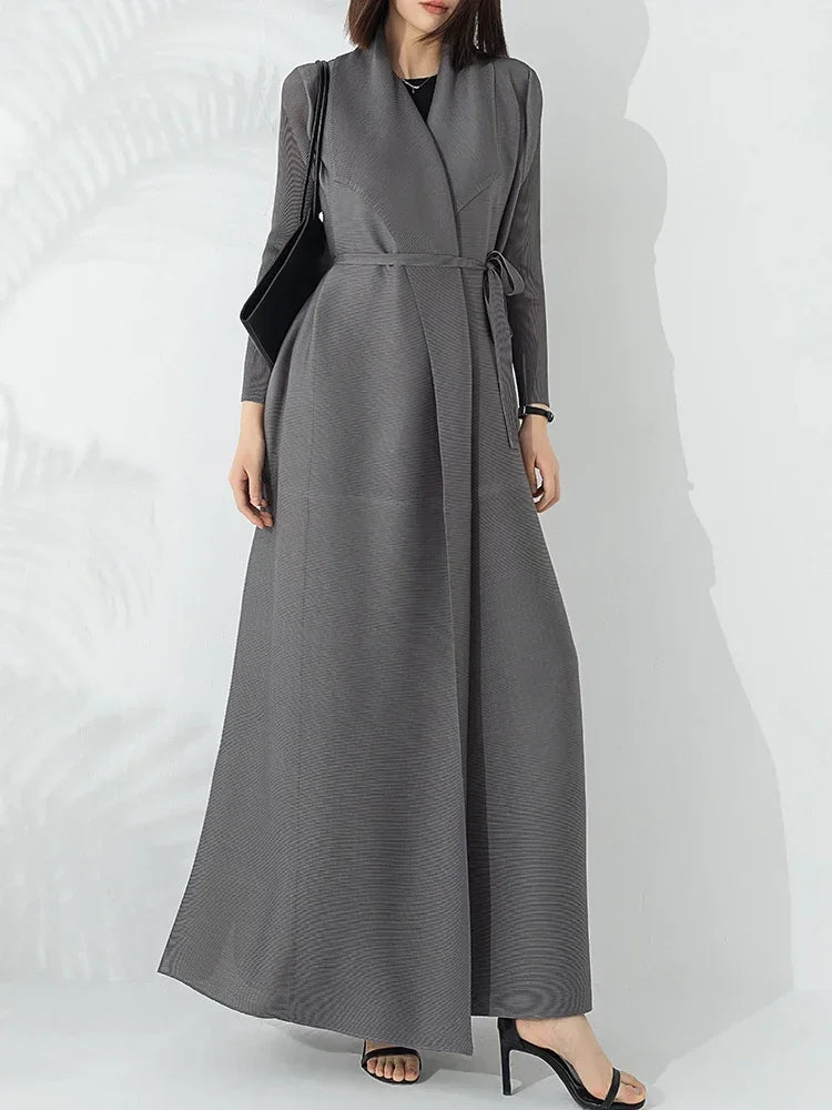 Elegant women's belted A-line coat with a chic funnel neck, perfect for stylish winter fashion.