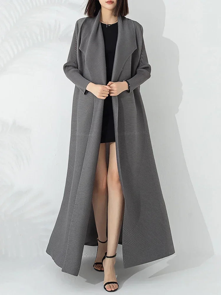 Fashionable women's long A-line coat featuring a flattering belt and a cozy funnel neck design.