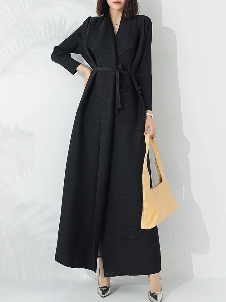 Stylish women's A-line coat with a classic belt and funnel neck, ideal for sophisticated cold-weather looks.