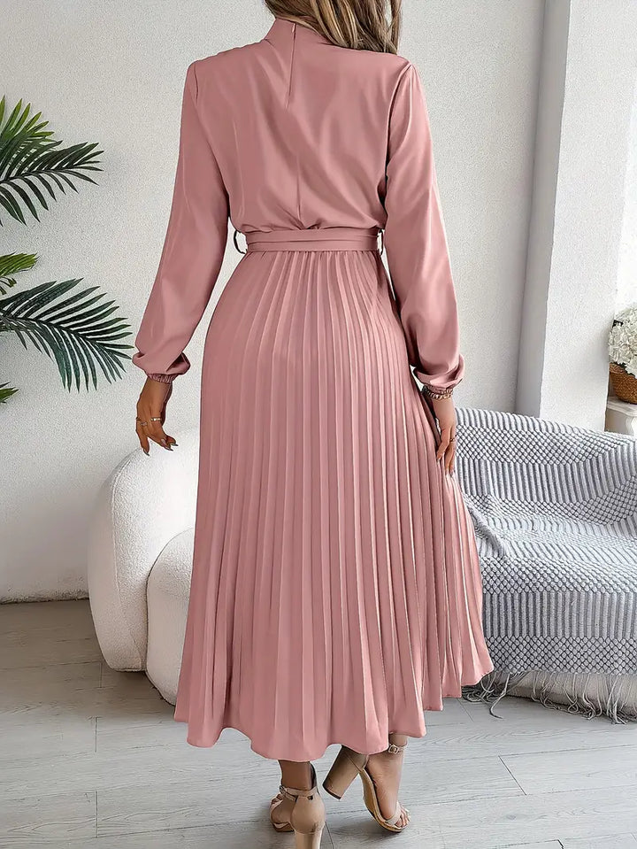 Go-to versatile midi dress for women, with elegant pleats, long sleeves, and a flattering belted waist.
